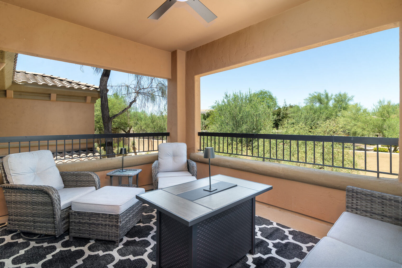 Private balcony with firepit table and desert outlook
