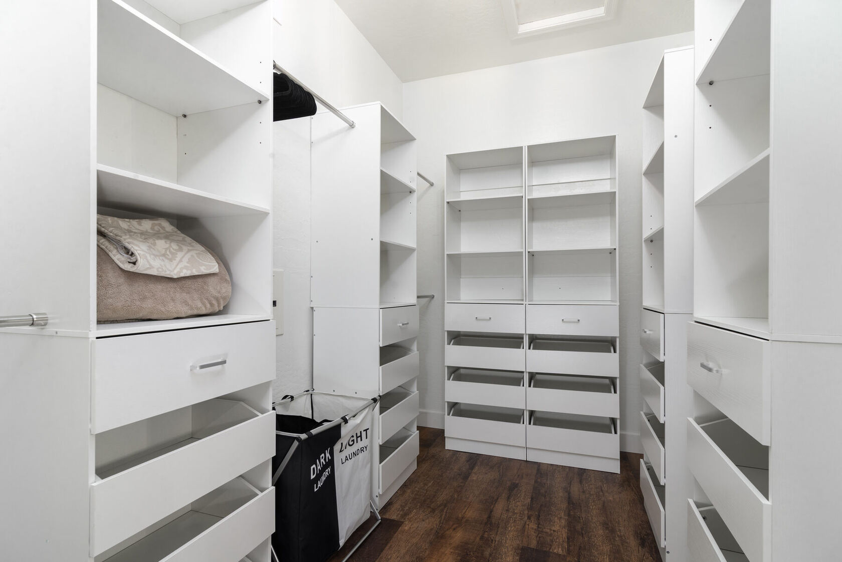 Walk-in closet with built-in cabinetry